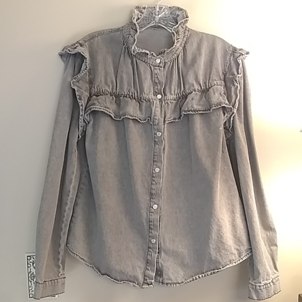 ruffled gray blouse